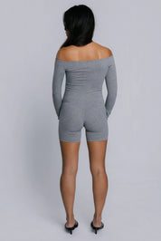 Model wearing the Billy Bardot Sculpt Suit in grey, back view.