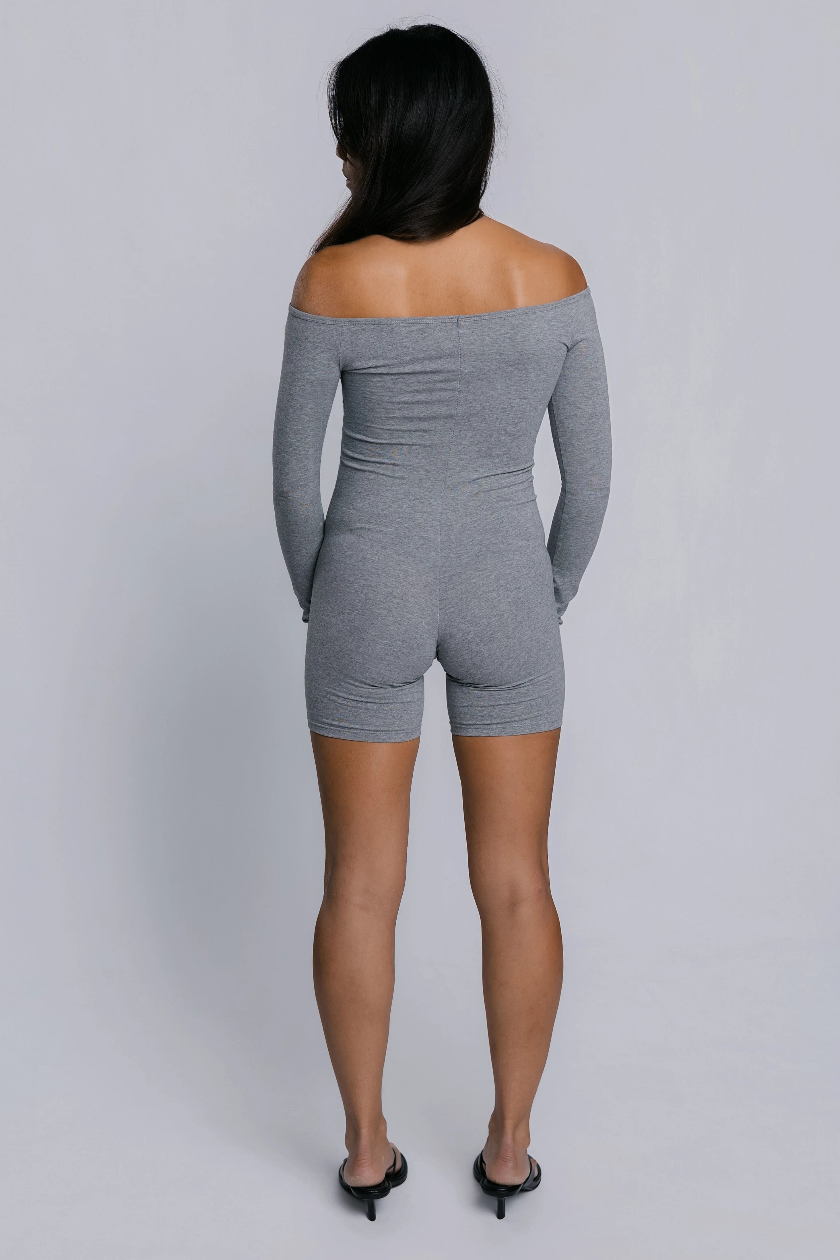 Model wearing the Billy Bardot Sculpt Suit in grey, back view.