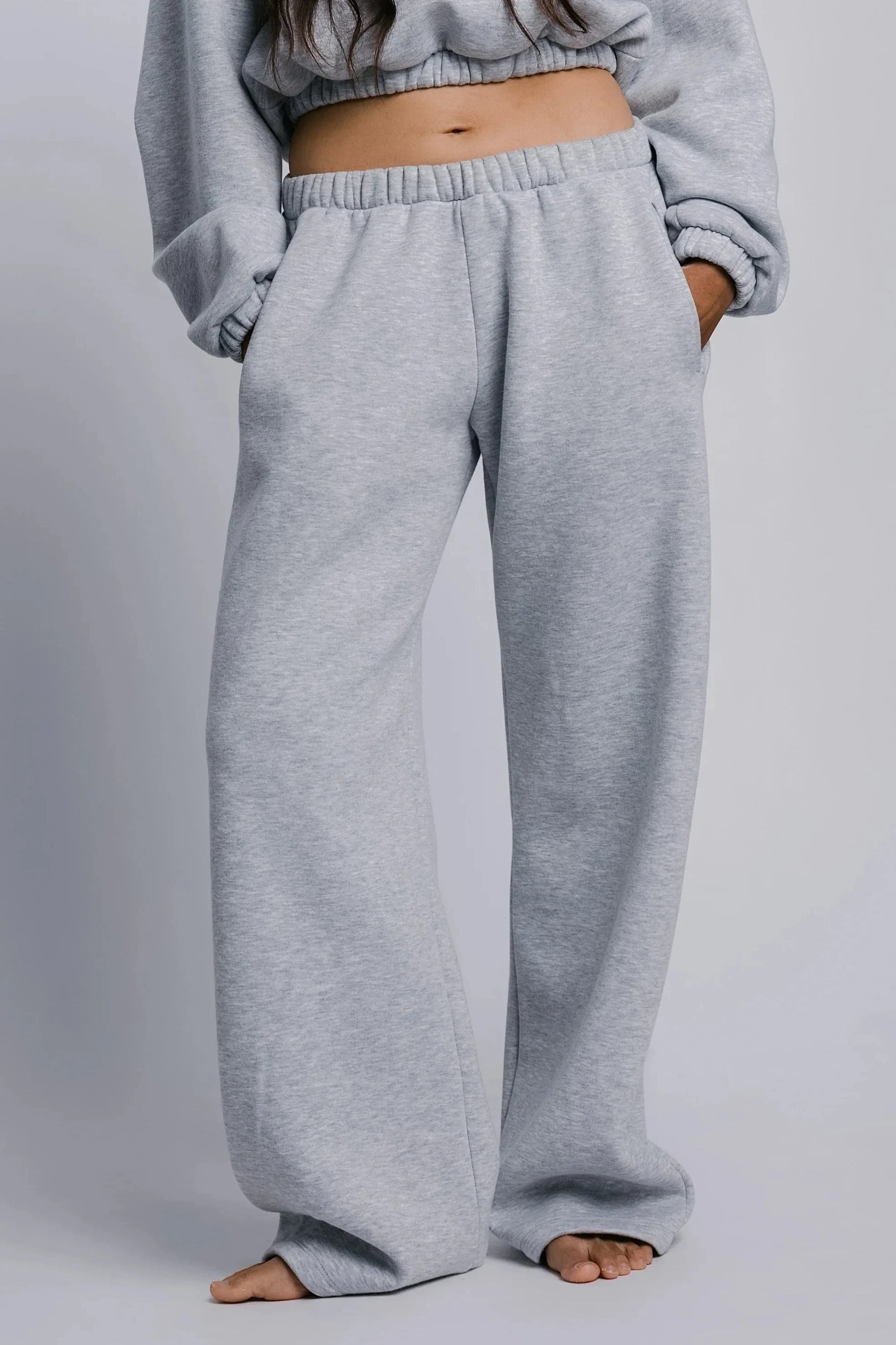 Model wearing the Billy Off-Duty Sweatpant in grey, front view.