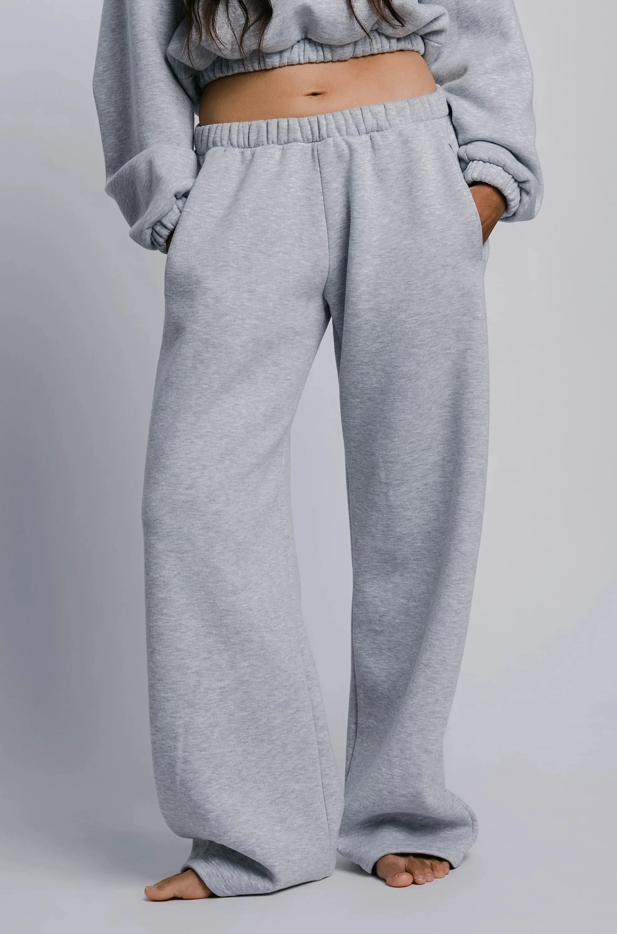 Model wearing the Billy Off-Duty Sweatpant in grey, front view.